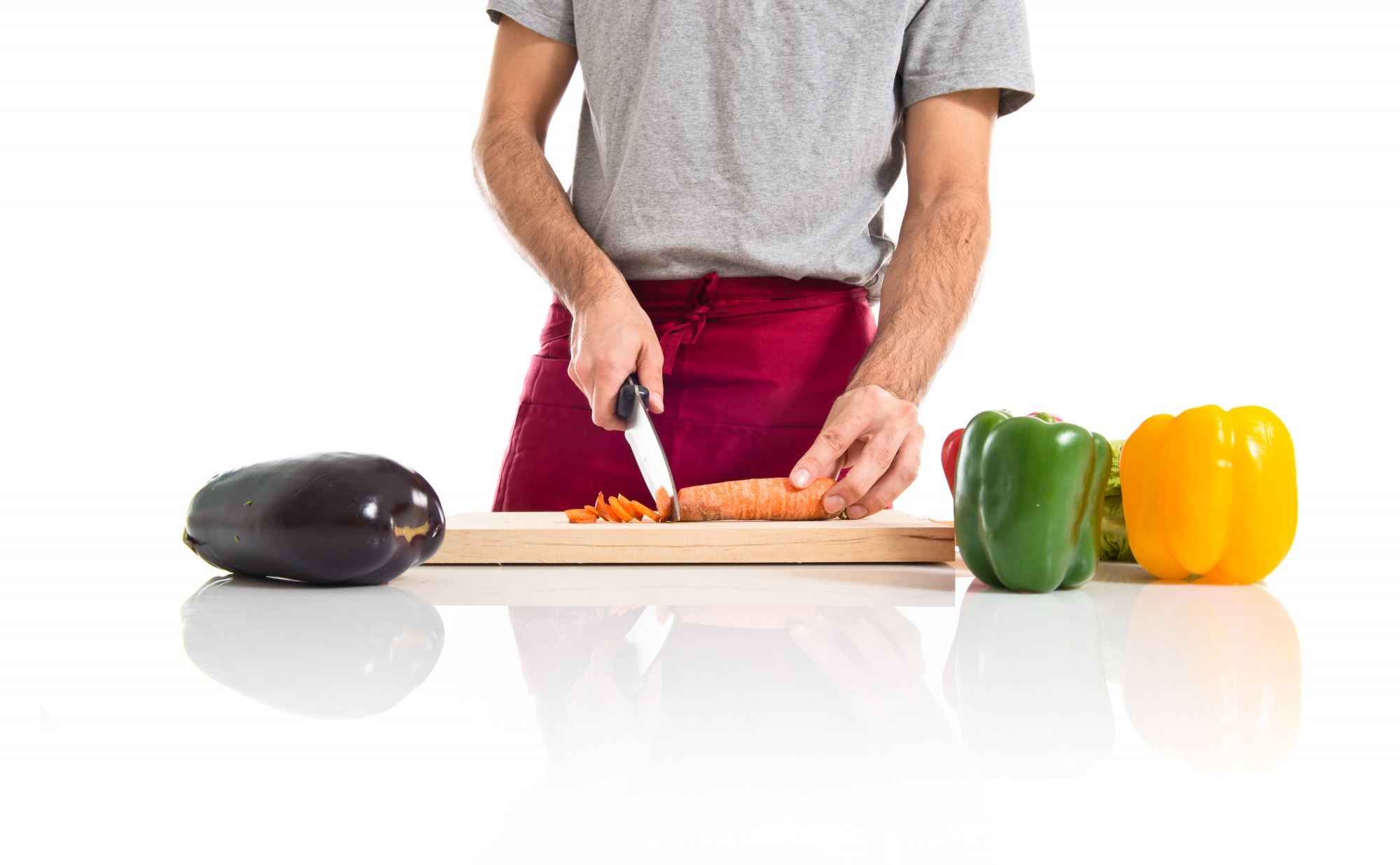 Alumno practicando corte con chef